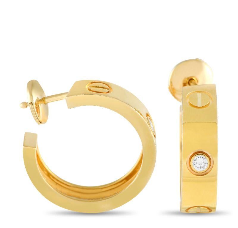 These iconic 18K Yellow Gold Cartier LOVE earrings will continually make a subtle statement. Each one of these gracefully curved earrings measures 0.75” round and comes complete with a singular diamond accent at the center of the design. 
 
 This