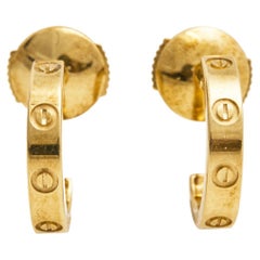 Cartier Boucles d'oreilles créoles Love en or jaune 18k