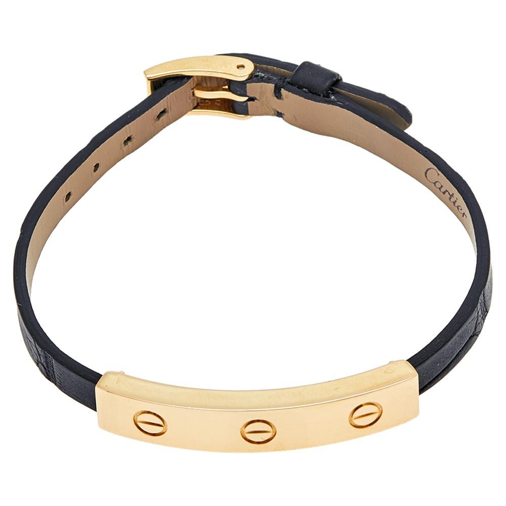 This Cartier Love bracelet has a wristwatch style of design. It has a comfortable leather buckle strap that holds an 18k yellow gold bar engraved with the iconic screw motifs—the Love collection's signature.

Includes: Original Case