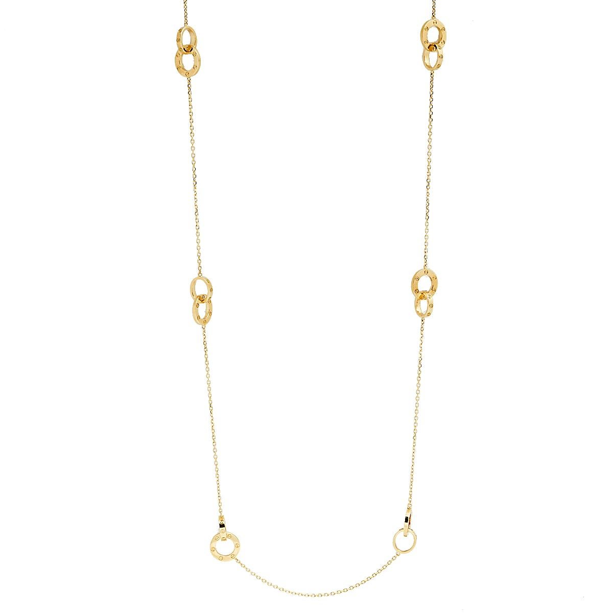 This long station necklace heralds Cartier's power to create magical pieces of jewelry. The creation is from the celebrated 'Love' line and it arrives in a harmonious gathering of interlocked rings, each one laid with the iconic screw motifs. The