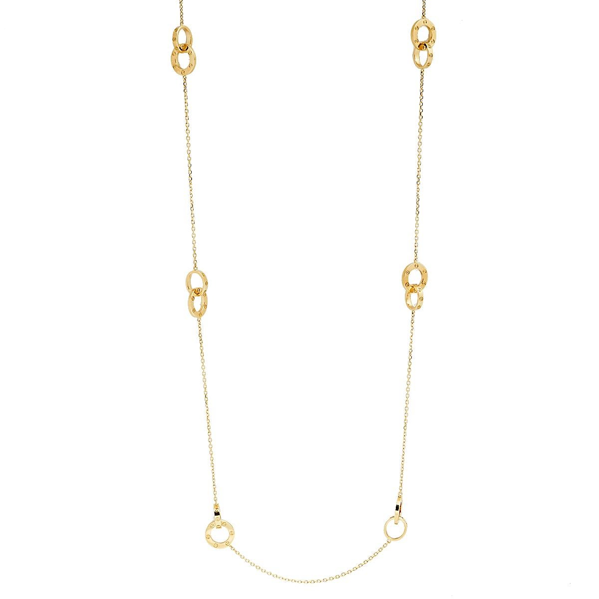 This long station necklace heralds Cartier's power to create magical pieces of jewelry. The creation is from the celebrated 'Love' line and it arrives in a harmonious gathering of interlocked rings, each one laid with the iconic screw motifs. The