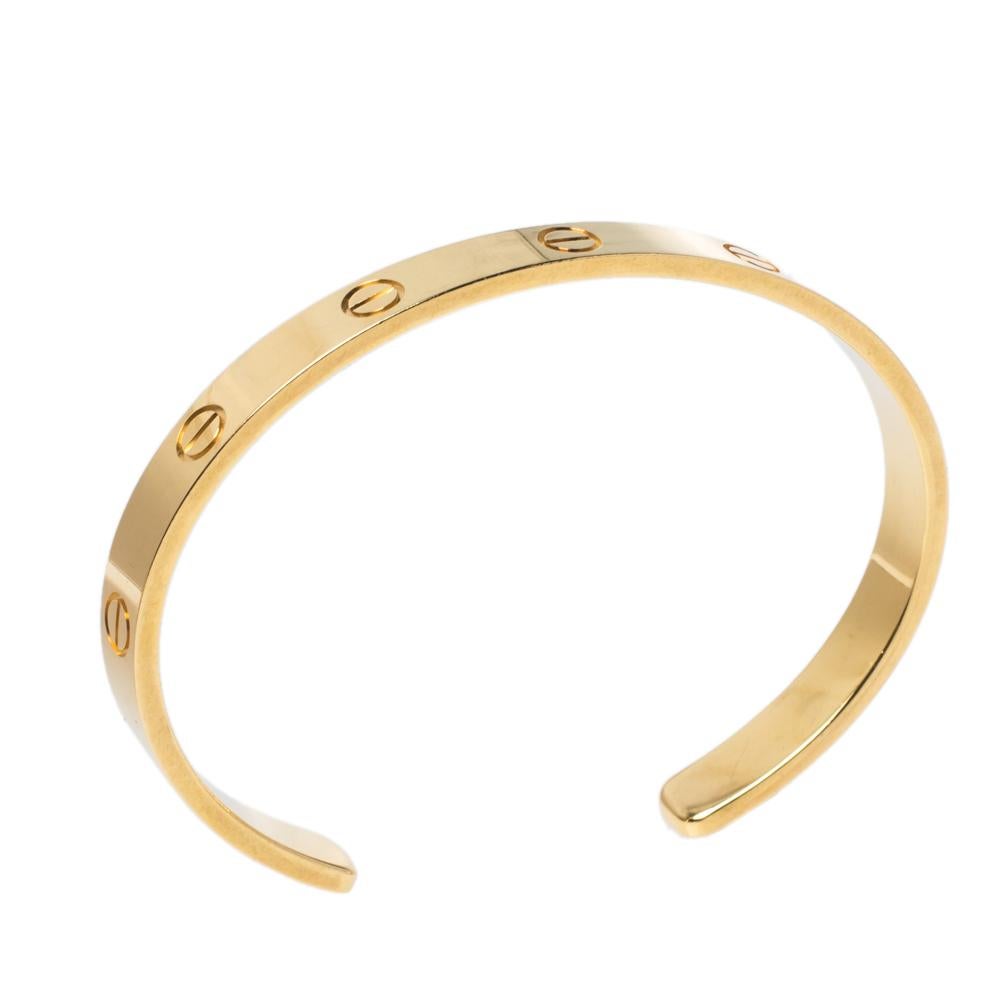 We fell in love with this Cartier LOVE bracelet at first glance. Look at its gorgeous yet subtle accents and picture how it will beautifully sit on your wrist and charm your peers. The creation is crafted from 18K yellow gold into an open cuff style