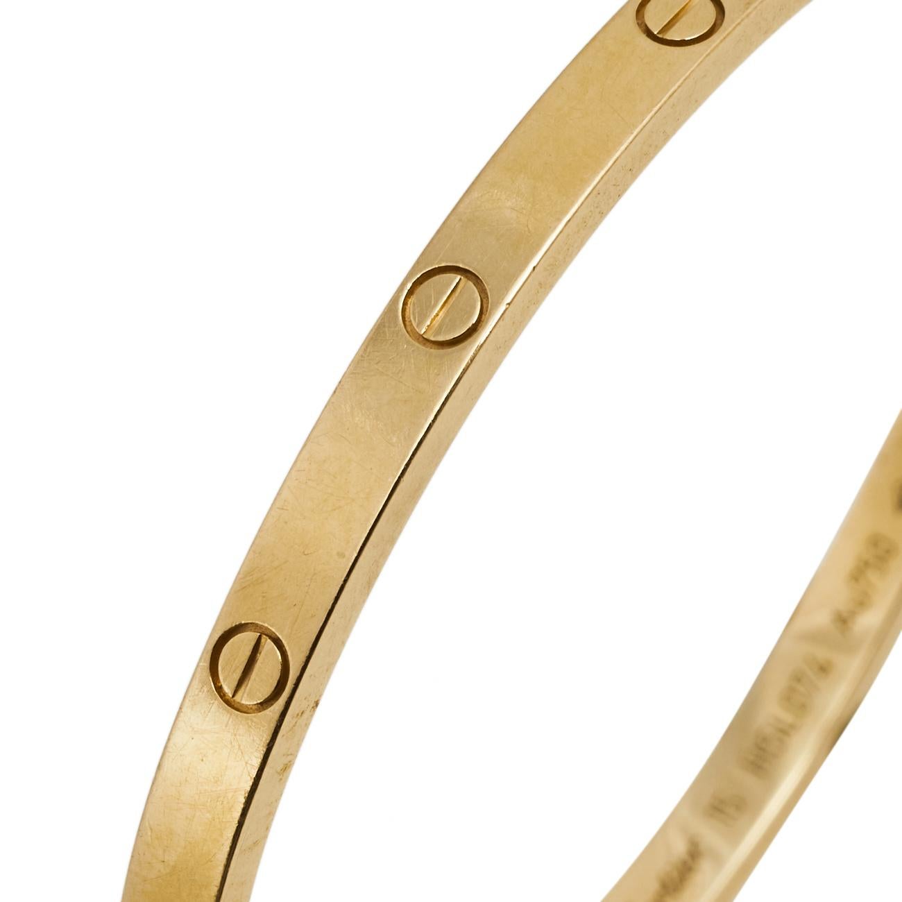 Cartier's Love bracelet is a modern symbol of luxury and a way to lock in one's love. Designed in an oval shape to comfortably sit around your wrist, the iconic love handcuff is laid with distinct screw motifs and secured by screw closure. This