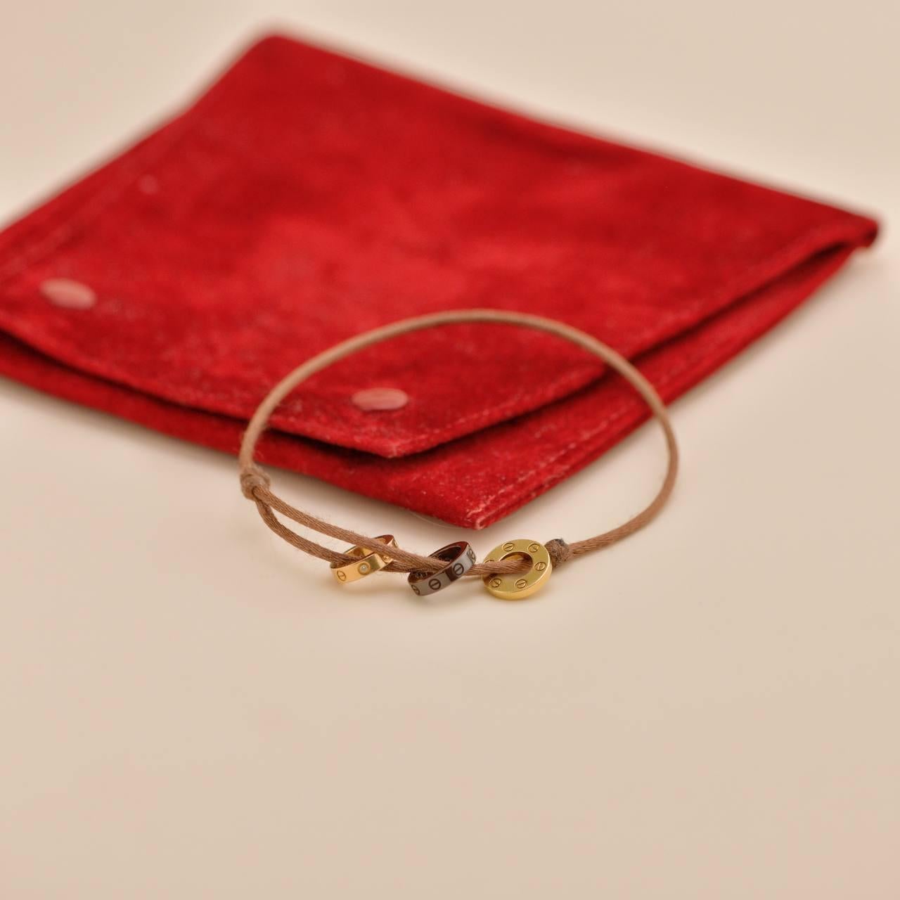 Cartier Love 18k Yellow & Rose 4 Diamond Sèvres Porcelain Brown Cord Bracelet In Excellent Condition For Sale In Banbury, GB