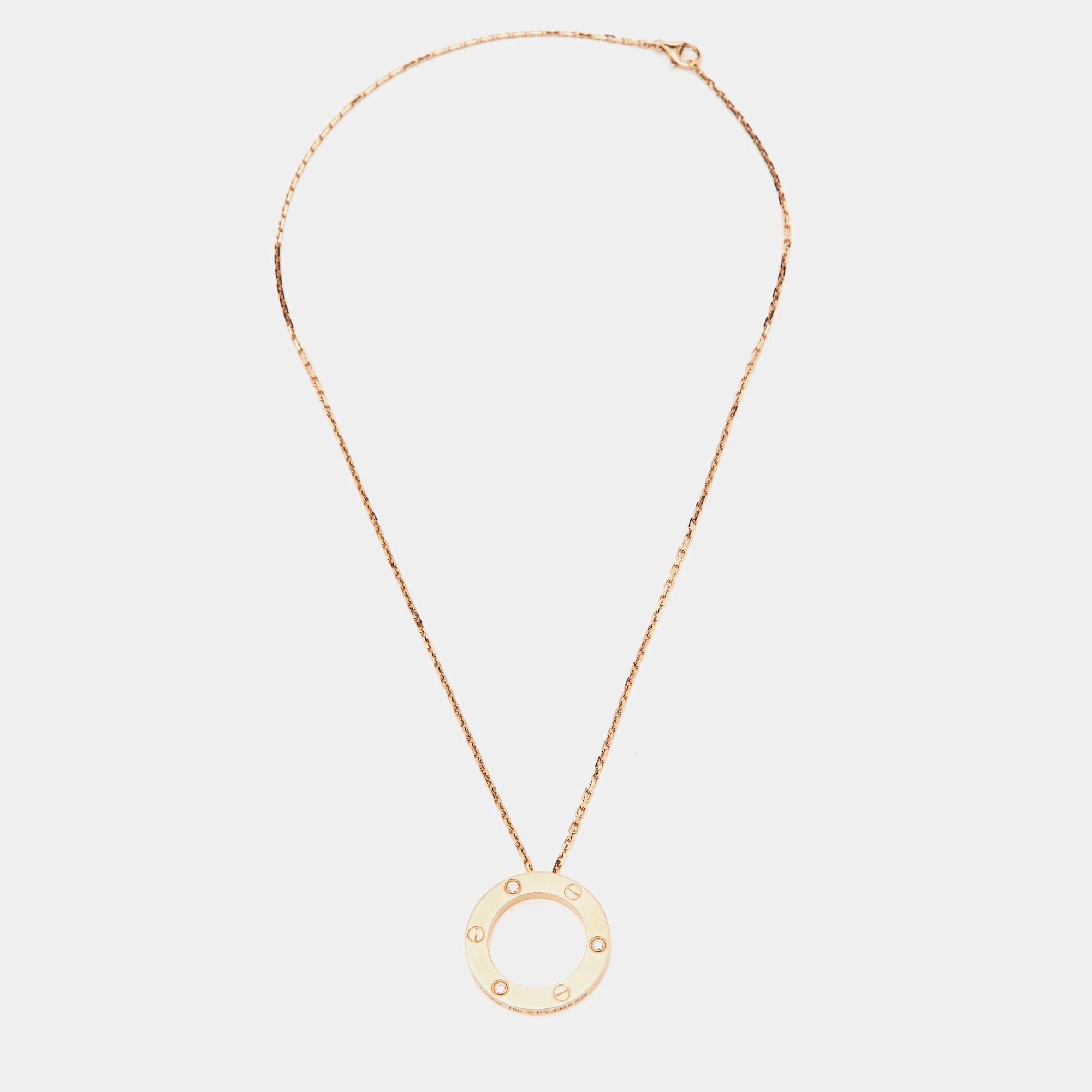 This radiant Love necklace from Cartier is not only beautiful to look at but is also a timeless piece that will be cherished for years to come. It has been crafted from 18K rose gold and features a chain-link carrying a ring pendant detailed with