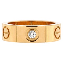 Cartier Love 3 Diamanten Ring aus 18 Karat Gelbgold mit Diamanten