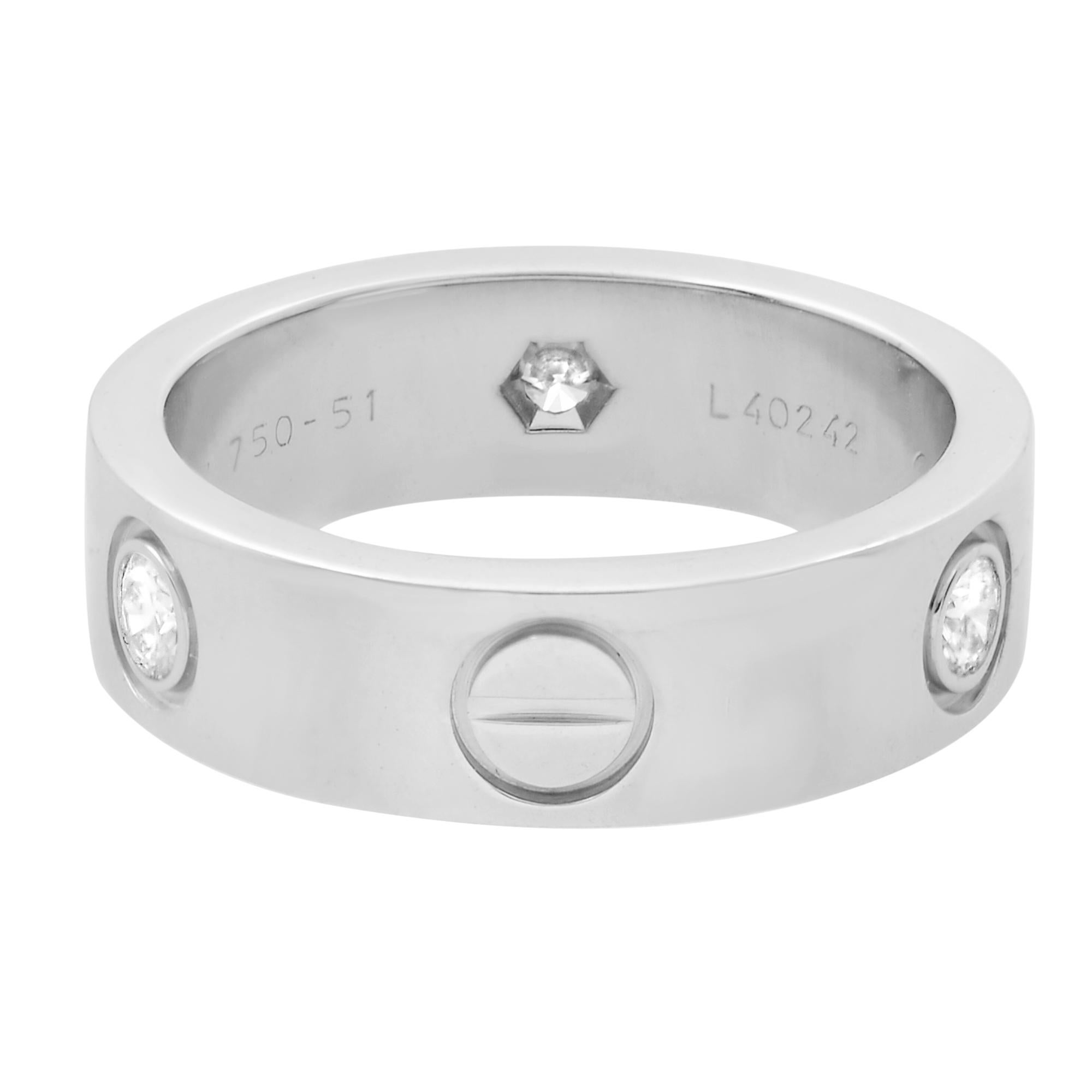 Cartier 3 diamonds Love ring crafted in 18k white gold. Set with 3 brilliant-cut round diamonds totaling 0.22 carats. Width: 5.5mm. Ring size 51 US 5.75. Excellent pre-owned condition. Comes with a box but without papers.