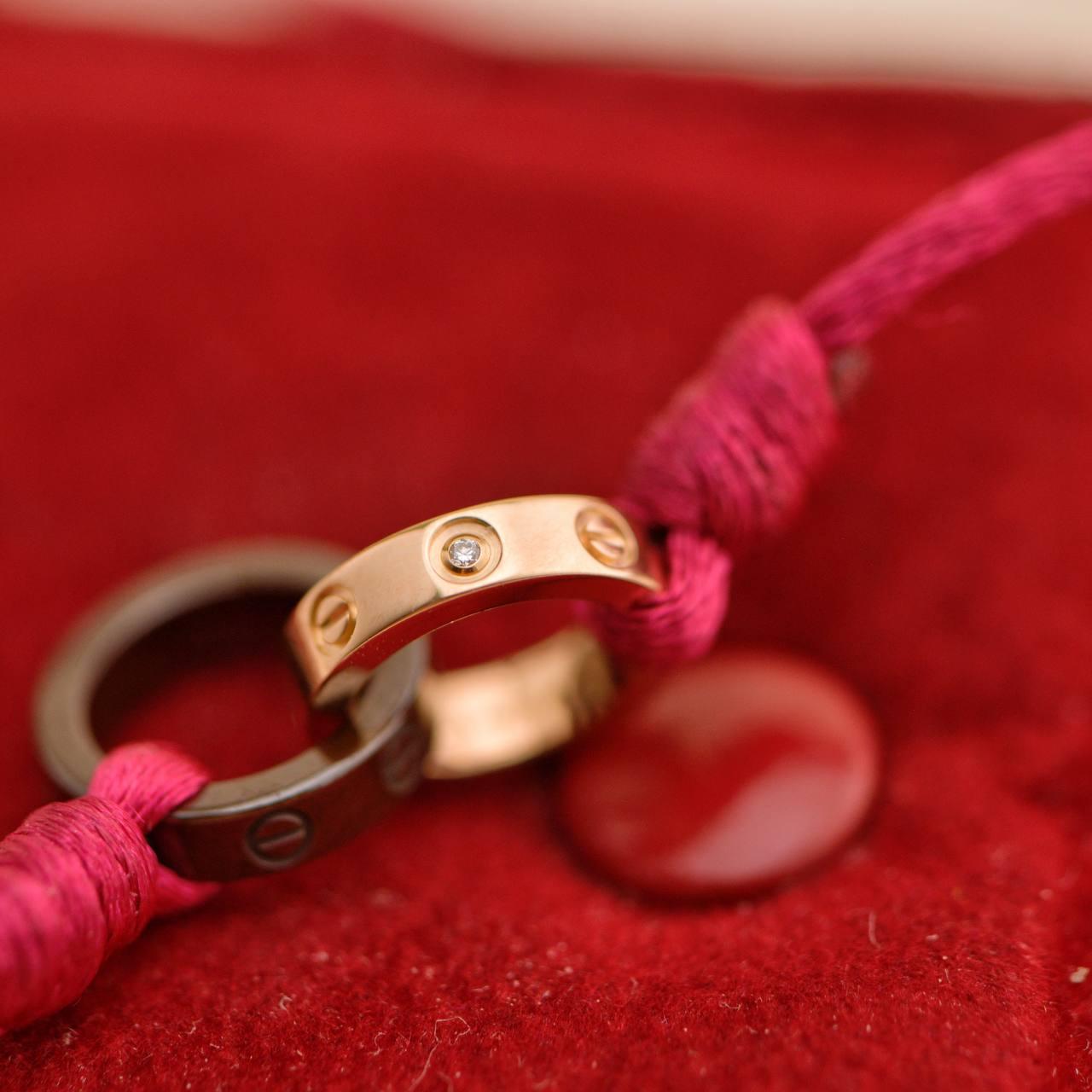 Women's or Men's Cartier Love 4 Diamond 18K Rose Gold Sevres Porcelain Red Silk Cord Bracelet For Sale