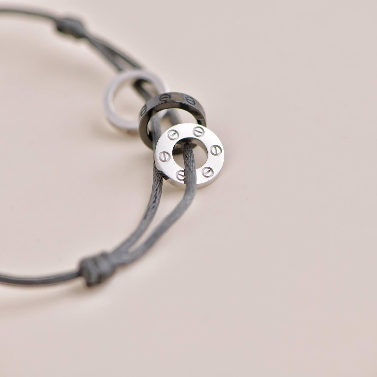 Cartier Love 4 Diamond 18K White Gold Sevres Porcelain Black Silk Cord Bracelet In Excellent Condition In Banbury, GB