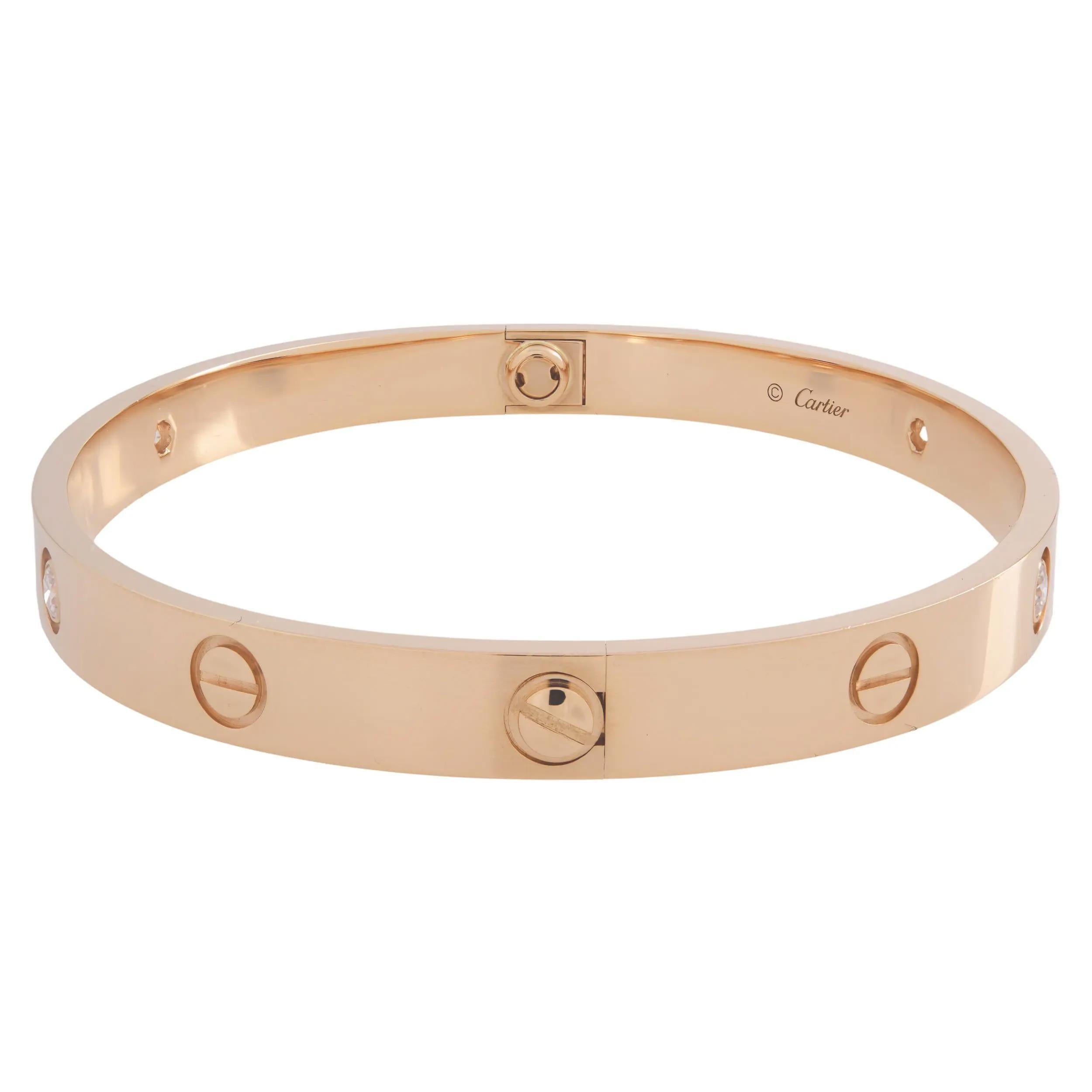 Cartier LOVE bracelet crafted in 18K Rose Gold, set with 4 round brilliant cut diamonds weighing 0.42 carats. A close-fitting, oval bracelet composed of two rigid arcs. New style screw system. Comes with a screwdriver. Width: 6.1mm. Size 19.