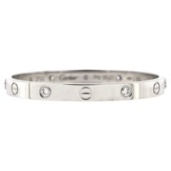 Bracciale Love 4 diamanti Cartier in oro bianco 18 carati e diamanti