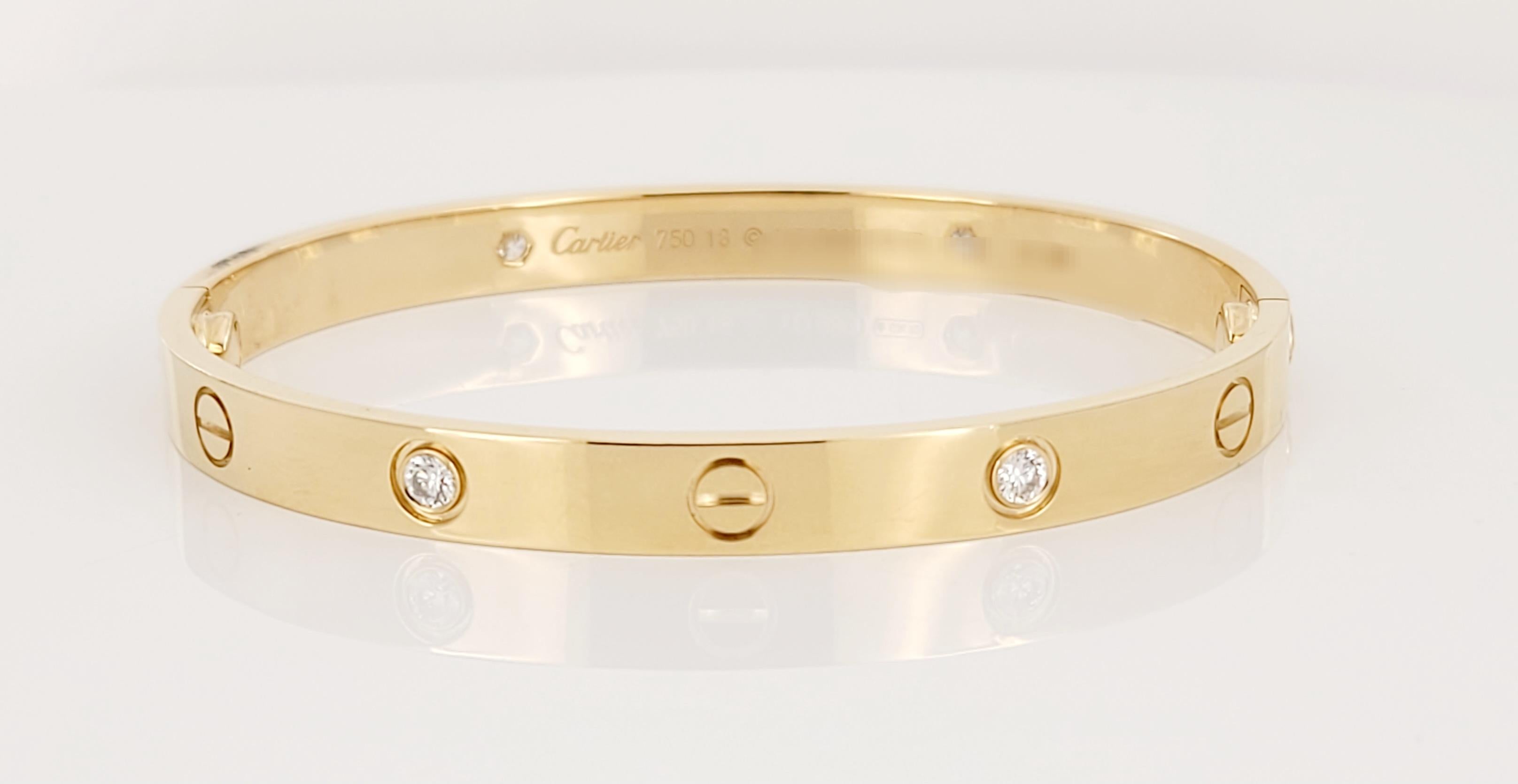 Collection: Cartier 
Style: Love
Metal Yellow Gold
Metal Purity: 18K 
Stones: 4 Round Brilliant Cut Diamonds
Bracelet Size: Medium 18 
Condition: Mint 
Comes with Cartier Bracelet Box. No papers included