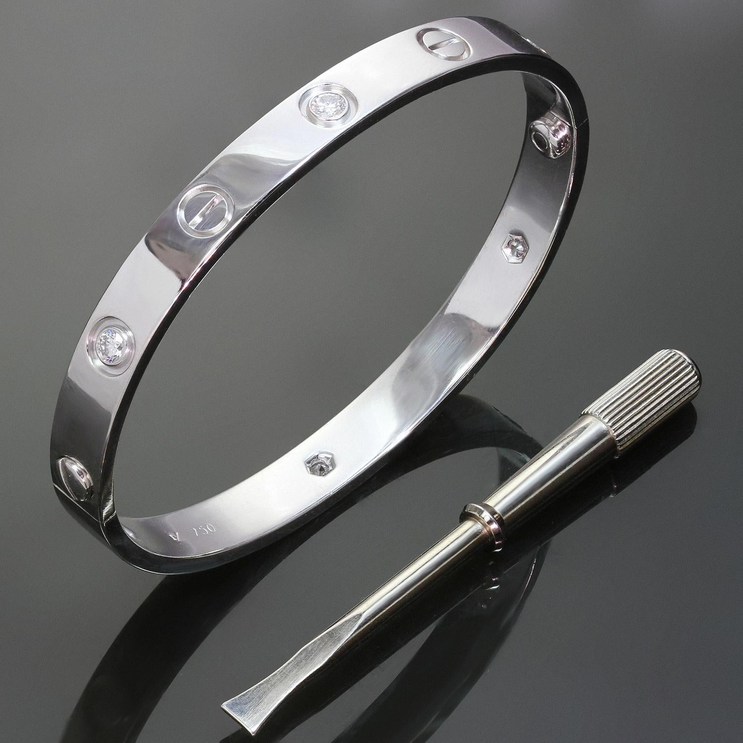 This iconic and timeless bracelet from Cartier's Love collection is crafted in 18k white gold and set with 4 round brilliant D-E-F VVS1-VVS2 diamonds weighing an estimated 0.40 carats. Completed with the original Cartier screwdriver. This bangle is