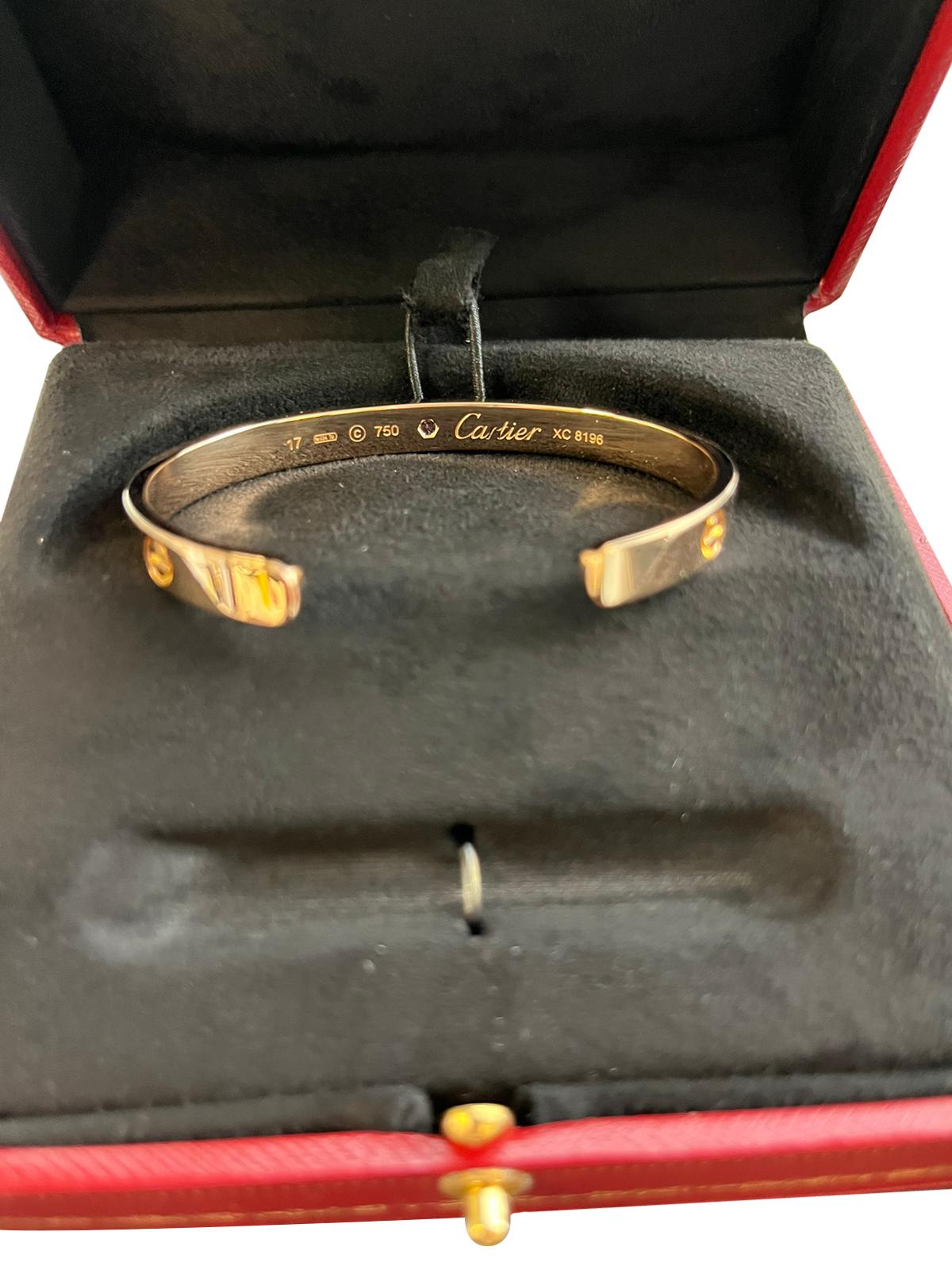 Cartier Love Bangle Bracelet 18 Karat Rose Gold with Sapphire Gemstone Size 17 In Good Condition For Sale In Aventura, FL