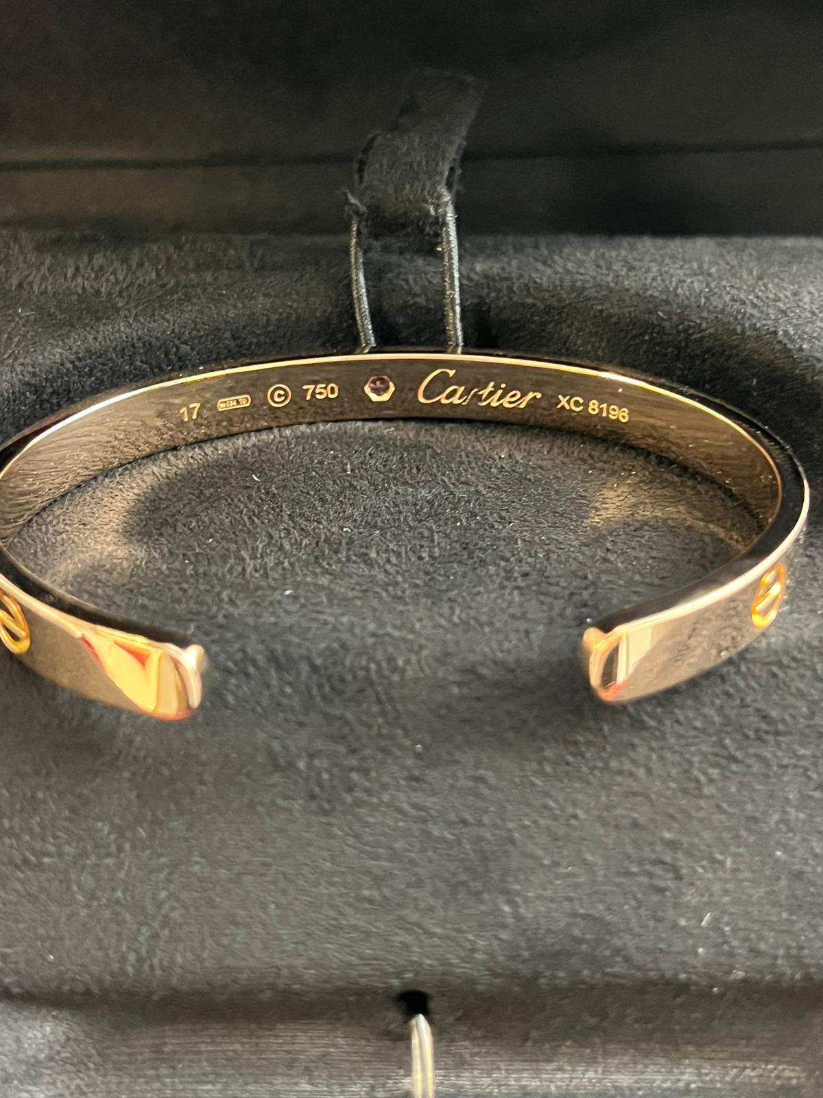 Women's Cartier Love Bangle Bracelet 18 Karat Rose Gold with Sapphire Gemstone Size 17 For Sale