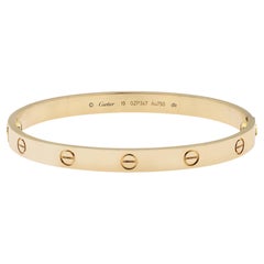 Cartier Love Armreif aus 18 Karat Gelbgold