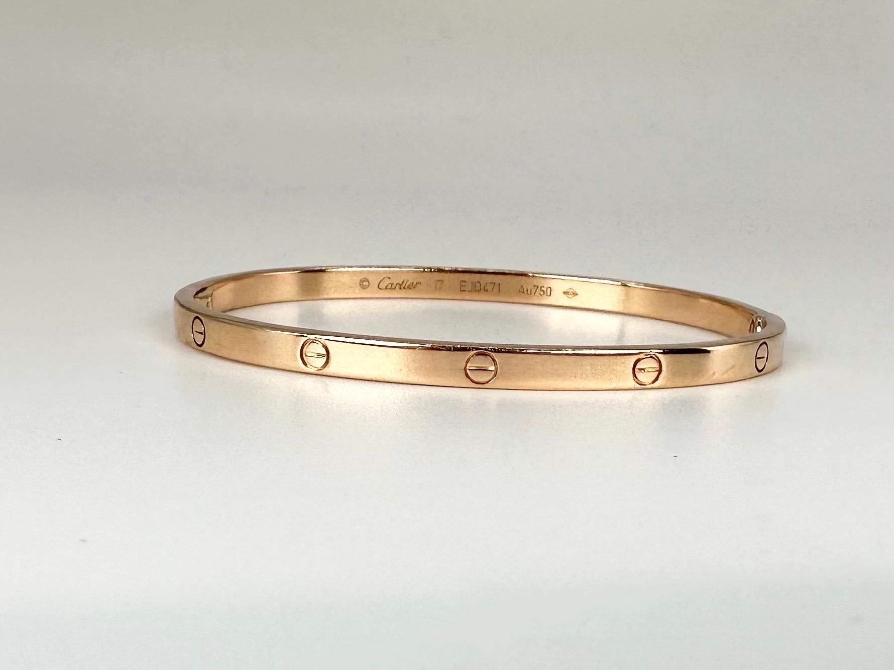 Cartier love bangle bracelet, 100% authentic!

GOLD: 18KT yellow gold
size: 17
Gram(s): 18.59
Item#: 440-00028 APTT

WHAT YOU GET AT STAMPAR JEWELERS:
Stampar Jewelers, located in the heart of Jupiter, Florida, is a custom jewelry store and studio