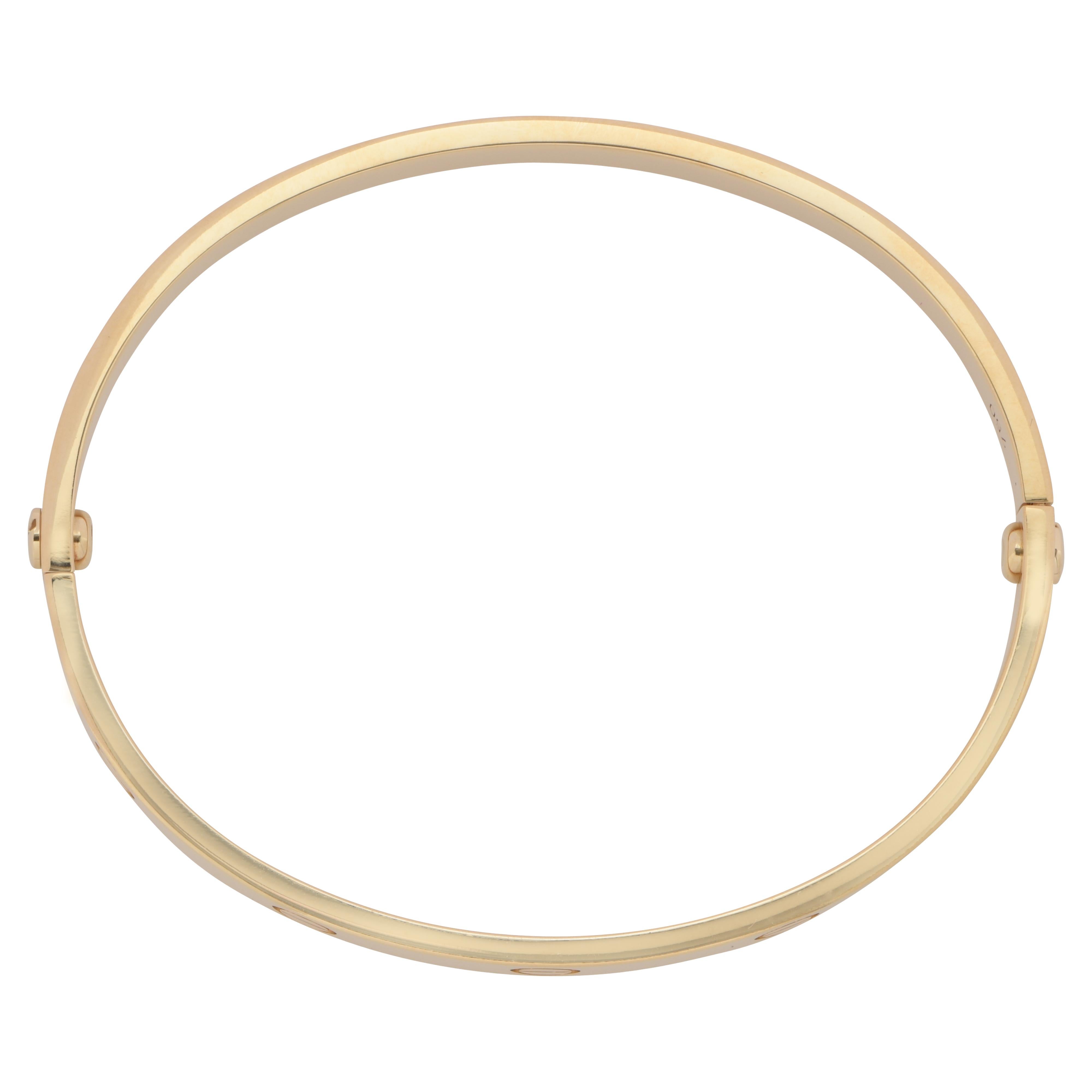 18 Karat yellow gold Cartier LOVE bracelet, Size 18. The Cartier love collection has created a timeless tribute to the symbol of love that transcends through an iconic style originating from the 1970s. The love collection screws and locks on to the