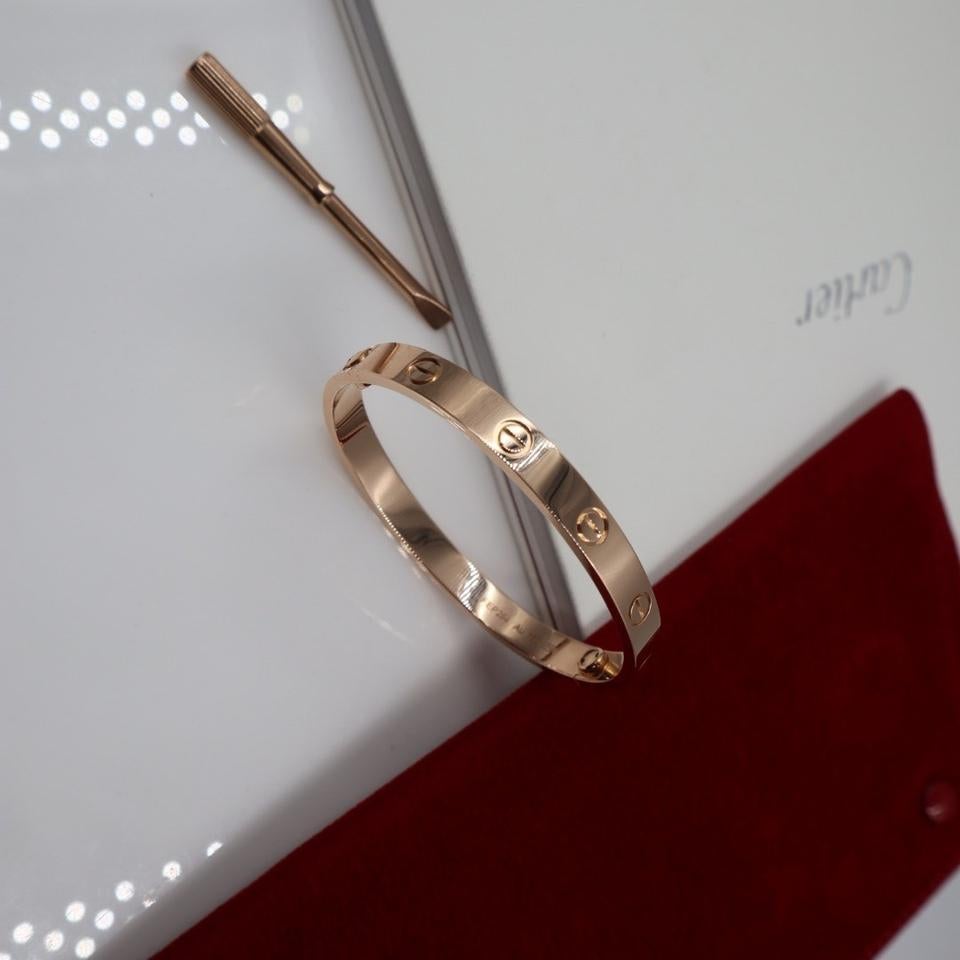 Excellent condition and absolutely amazing Cartier LOVE bangle!

Love collection bracelets are surrounded with lore. As the story goes, they could at first only be purchased by couples who would surrender the screwdrivers to one another. When