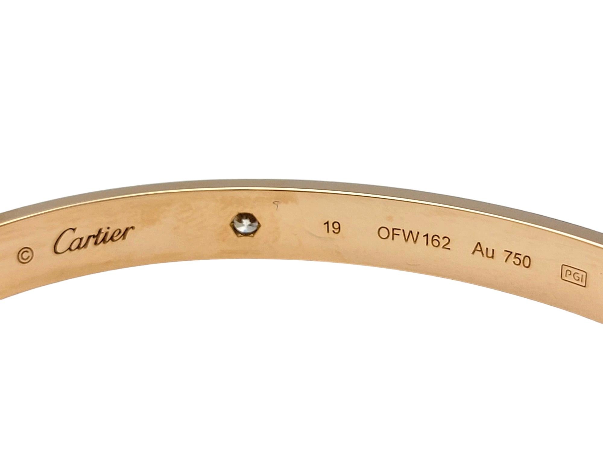 Cartier Love Bangle Bracelet with 4 Round Diamonds Set in 18 Karat Rose Gold In Good Condition In Scottsdale, AZ