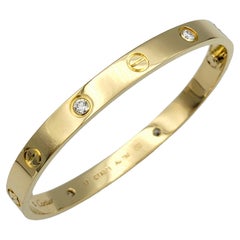 Cartier Love Bangle Bracelet with 4 Round Diamonds Set in 18 Karat Yellow Gold