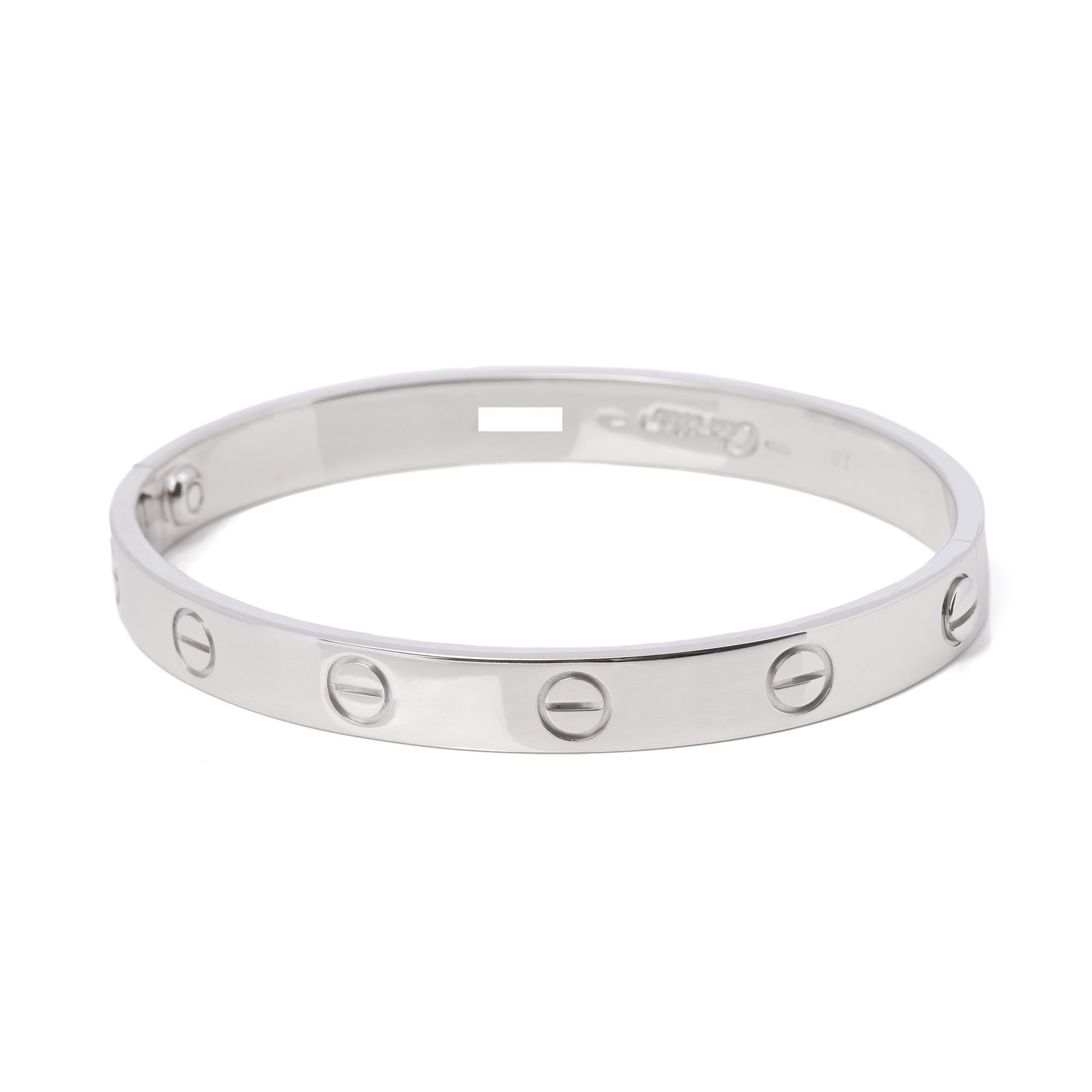 This bracelet by Cartier is from their Love Collection and featuring the iconic screw details, including the original screw fastening. Accompanied by a Cartier Pouch. 
ITEM