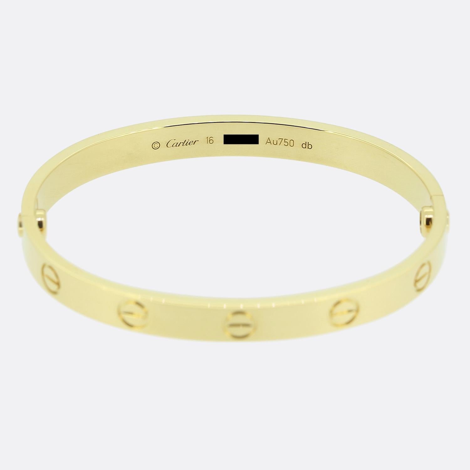 Here we have an 18ct yellow gold bangle from the world renowned luxury jewellery house of Cartier. This bangle forms part of the LOVE collection and features the iconic screw motif around the entire outer edge.

