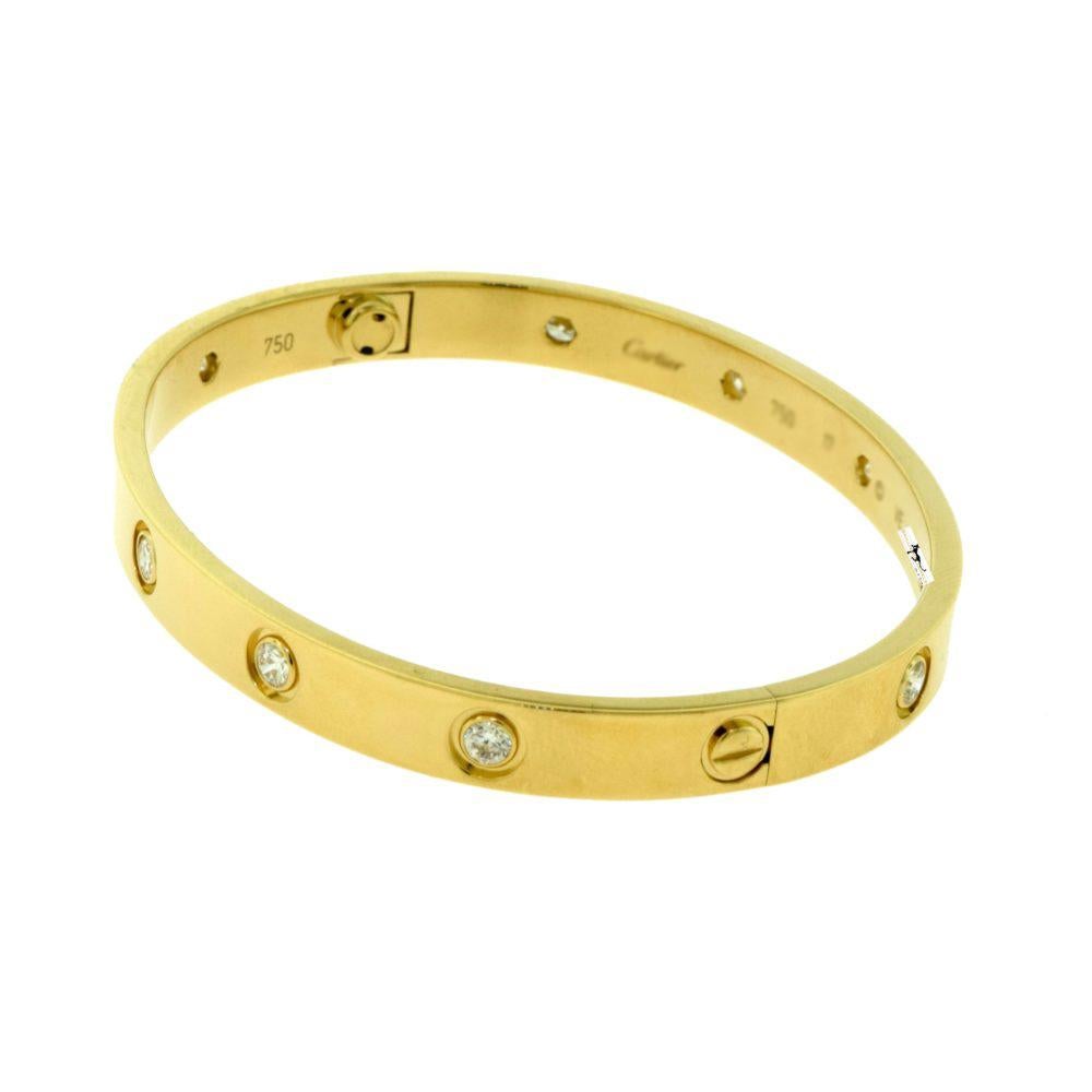 Designer: Cartier

Collection: Love

Style: Bangle Bracelet

Metal: Yellow Gold

​​​​​​​Metal Purity: 18k

Stone: Round Brilliant Cut Diamonds

Total Carat Weight: 0.96 ct

Bracelet Size: 21 = 21 cm

Hallmarks: 21, Au750 Cartier, Serial