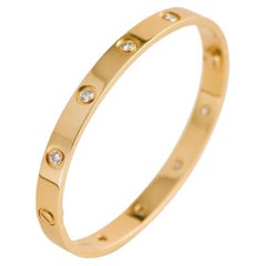 Cartier Love-Armband aus Gelbgold mit 10 Diamanten, Größe 17