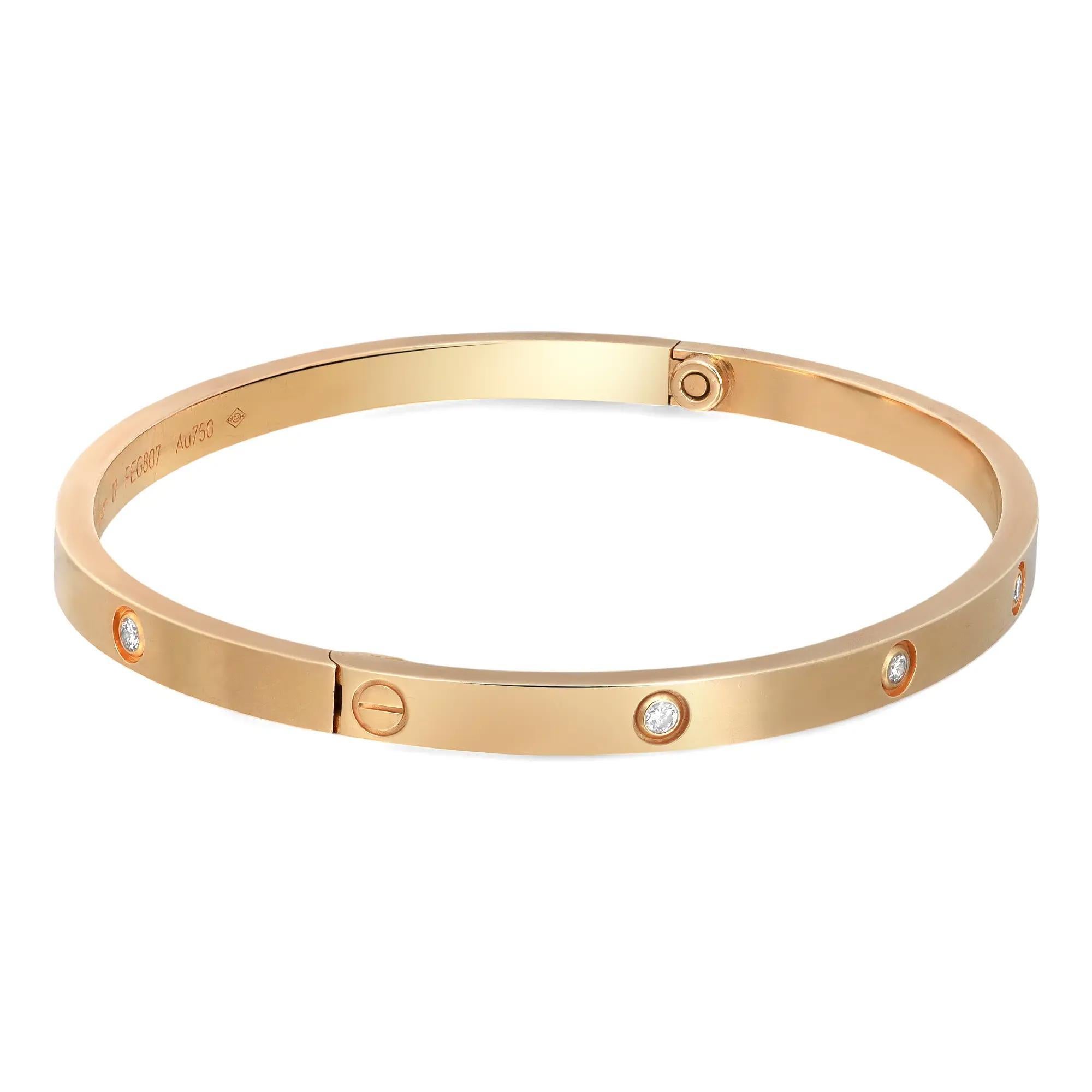 Cartier Love 10 diamonds small model bracelet. Crafted in 18K yellow gold. Width: 3.65mm. Size 17. Excellent pre-owned condition. Total weight: 19.80 grams. Excellent preowned condition. Original Cartier box and paper are not included. Comes with a