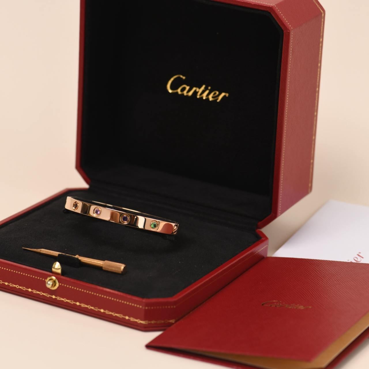 SKU	AT-2679
Comes With	Box and card
Date	2017
Model	B6036517
Serial Number	CU****
Size 	17 
Metal	18k Rose Gold
Stones	Pink Sapphire, Orange Garnet, Yellow Sapphire, Green Garnet, Amethyst
Weight	Approximately 30.3