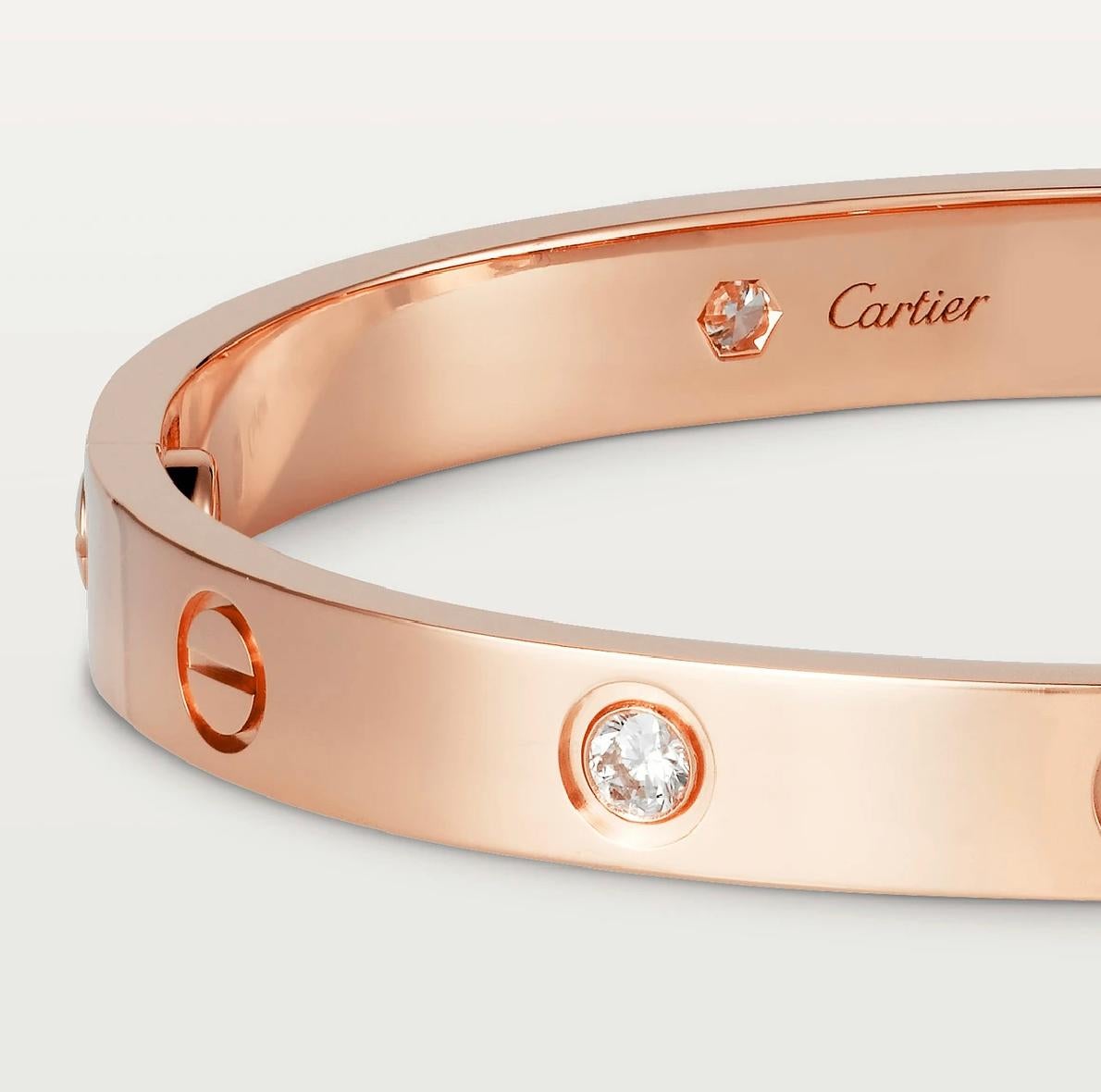 Cartier LOVE Bracelet, 18 Carat Rose Gold with 4 Diamonds

Cartier LOVE bracelet in 18 carat pink gold, set with 4 round brilliant-cut diamonds weighing 0.42 carats. Closed oval bracelet composed of two rigid arches that are worn on the wrist and