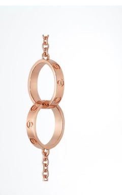 Cartier Love Bracelet, 18 Carat Rose Gold with Two Interlocking Love Rings