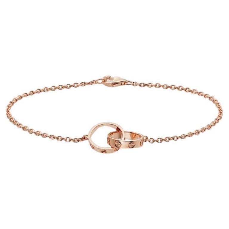 Cartier Love Bracelet, 18 Carat Rose Gold with Two Interlocking Love Rings  at 1stDibs