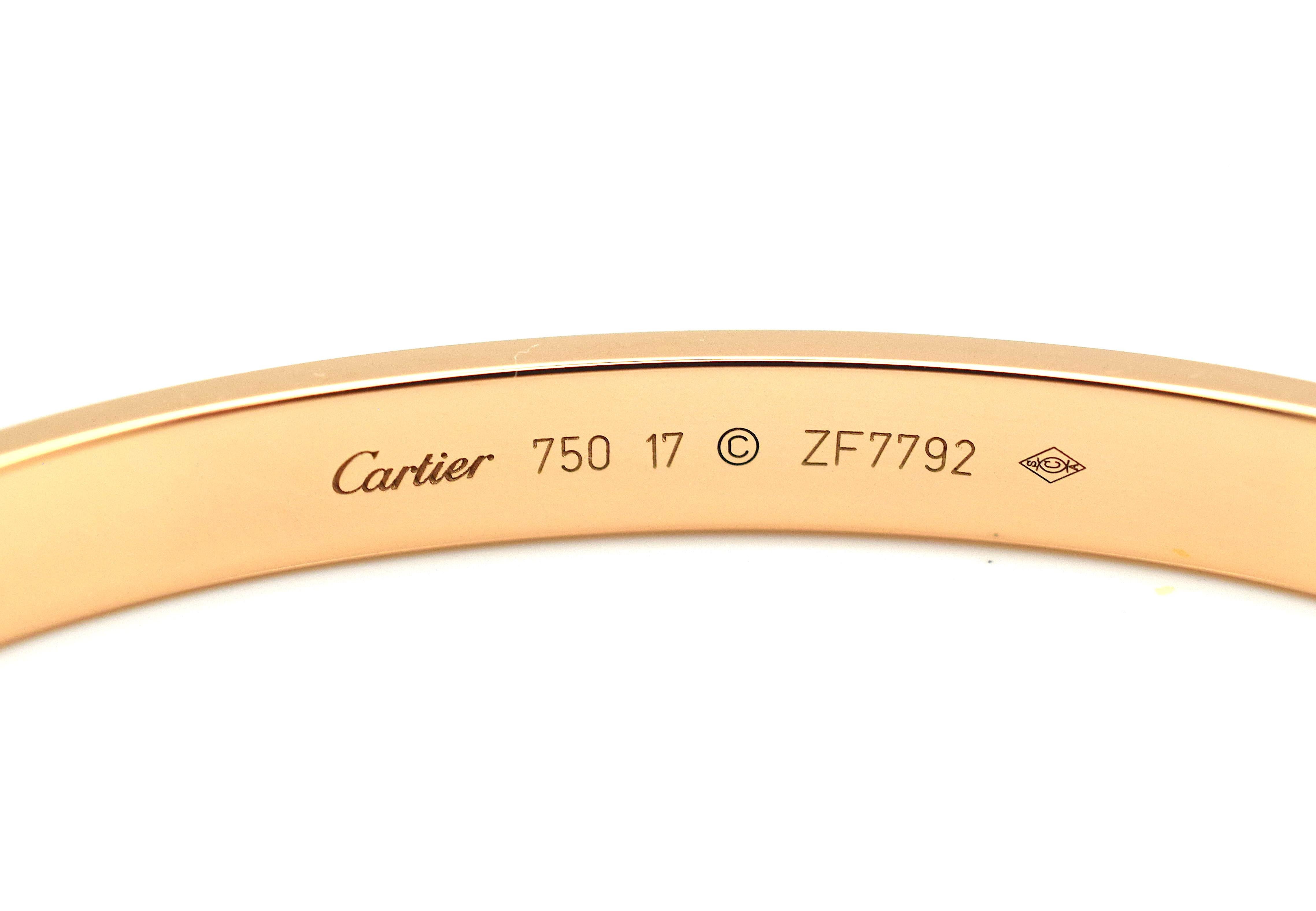 A signature 18k Rose Gold Cartier bracelet from the Love collection. The bracelet is a size 17 and has a gross weight of 33.0 grams. Original box and key included. Pristine condition, shows no scratches or wear. Bracelet is hallmarked Serial #