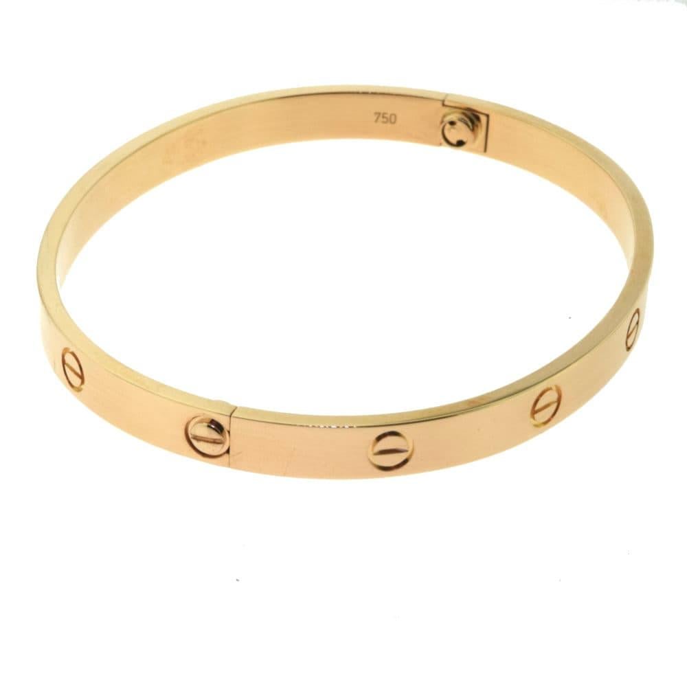 Designer: Cartier

Collection: LOVE

Style: Bangle/Bracelet

Metal: Yellow  Gold

Metal Purity: 18k

Bracelet Size: 20 = 20 cm 

Screw System: New Screw System( Screws Stay on) 

Hallmarks: Cartier, Serial No., Au750 

Includes:  24 Months