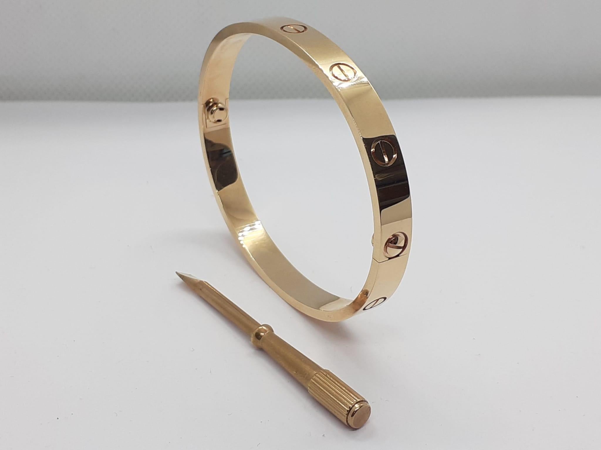 CARTIER LOVE BRACELET
In rose Gold in different measures this one is 17 and in 19
If the robust locking mechanism and miniature screw heads that characterized Cartier’s Love bracelet when it first appeared conjured crude, medieval hardware, there’s