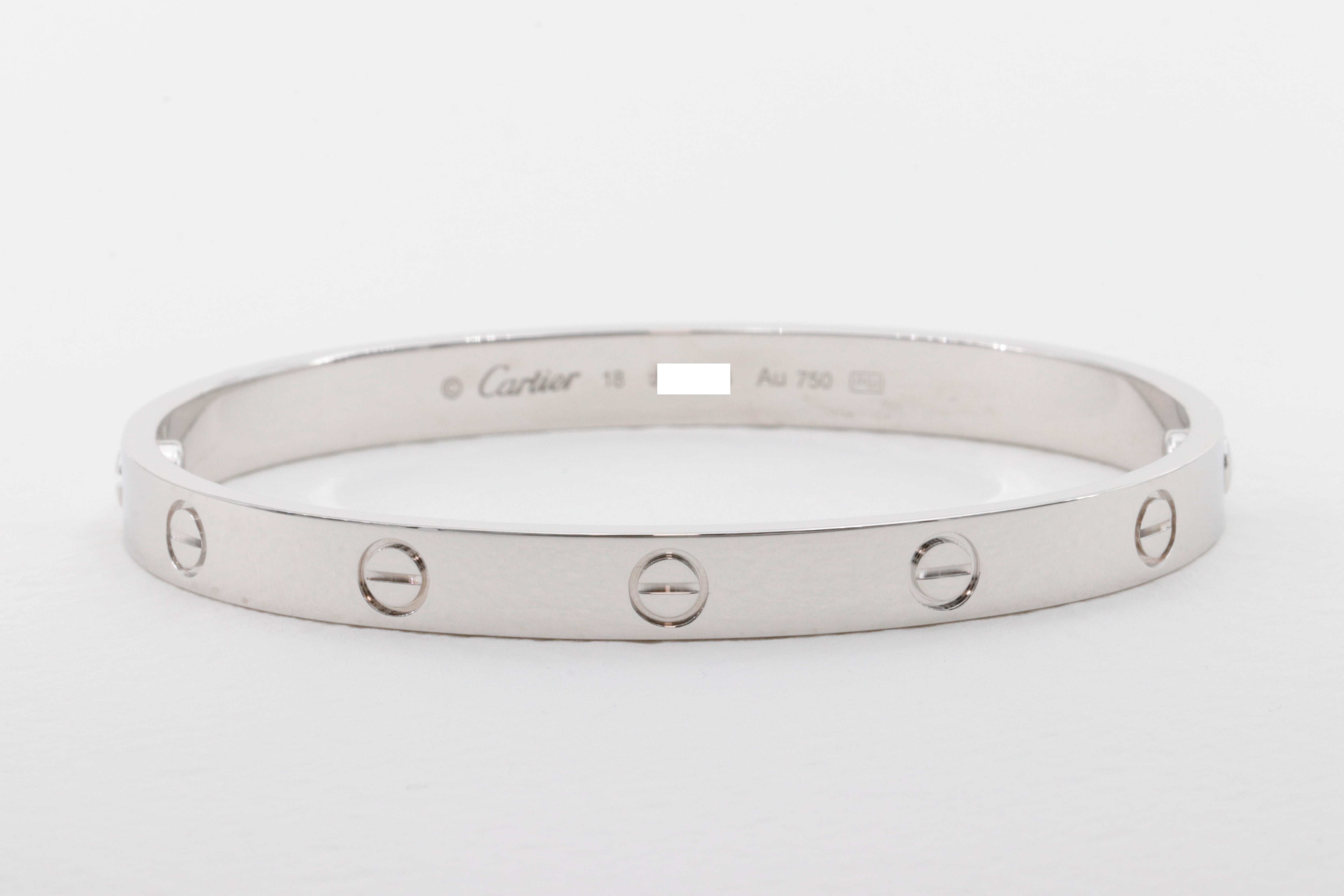 Cartier Love Bracelet 18k White Gold Box, Papers and Screwdriver Size 18

Professionally cleaned, detailed, polished and rhodiumed. 

Includes original Cartier box, paper work in folder, and screwdriver.