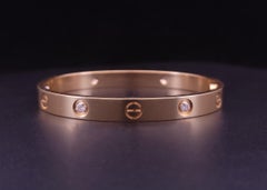 Cartier Love Bracelet, 18K Yellow Gold, 4 Diamonds, Circa 1969