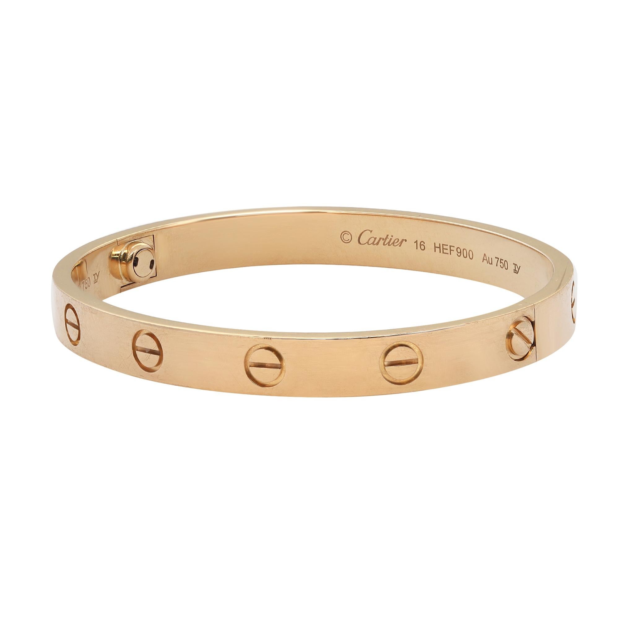 Cartier classic 18K yellow gold Love bangle bracelet size 16. Width: 6.1mm. New style screw system. Excellent preowned condition. Comes with a screwdriver, an original box and a certificate. 
