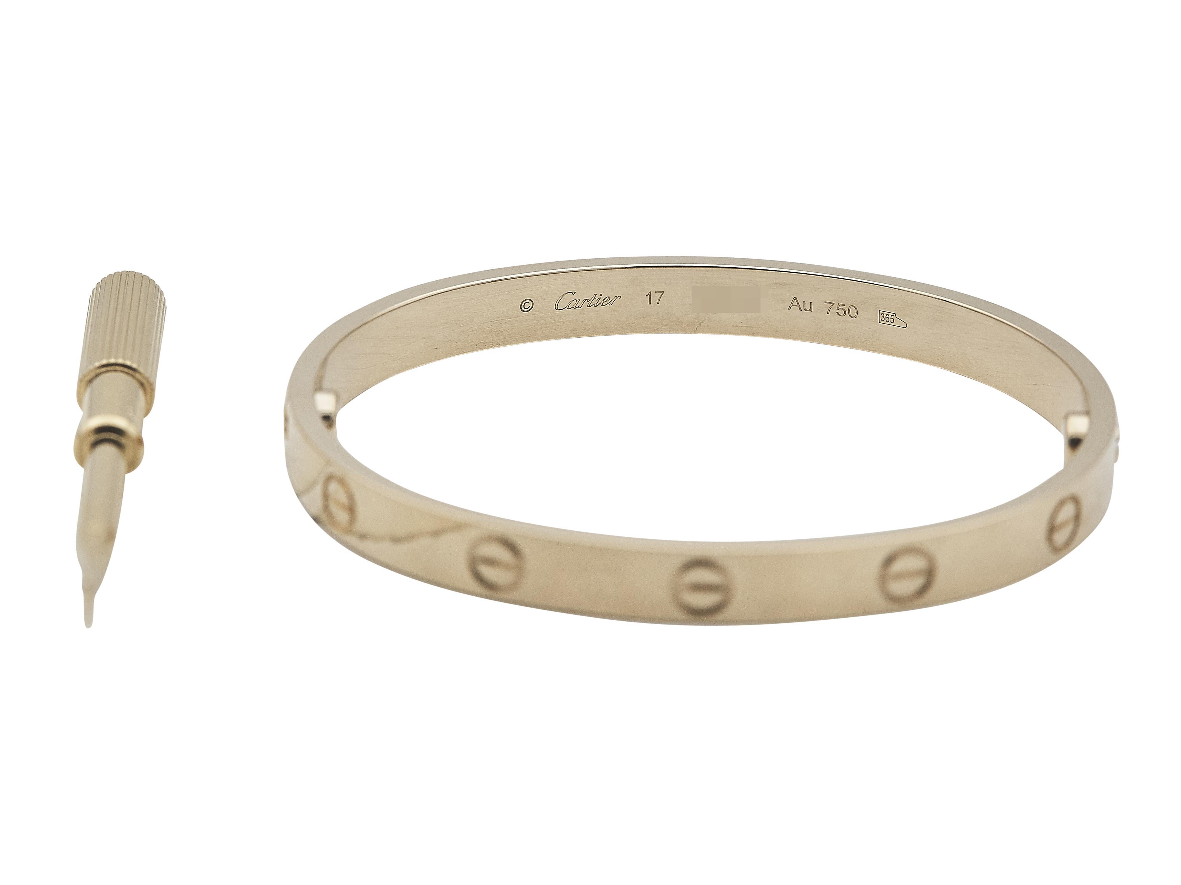 The Cartier Love Bracelet in 18K yellow gold is a timeless piece that blends luxury with industrial motifs. Now a true icon in the world of jewelry, it was originally imagined by Aldo Cipullo in 1969. This bracelet was designed to symbolize love and