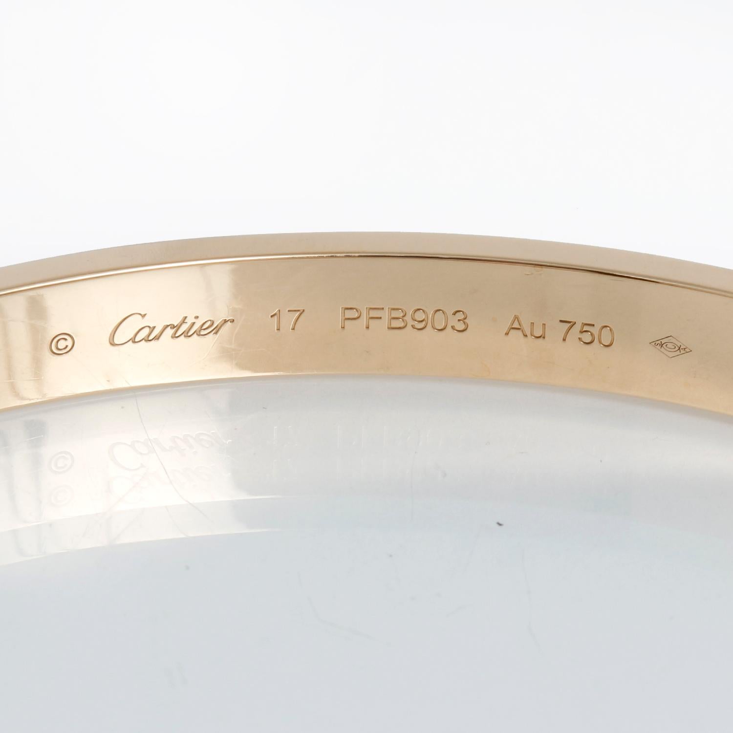 Cartier Love Bracelet 18k Yellow Gold Size 17 - This beautiful bracelet is stamped Cartier, 17, 750. This is a great piece for everyday as well as dress. Authenticity guaranteed. Like new condition with no dings or scratches. Includes screwdriver