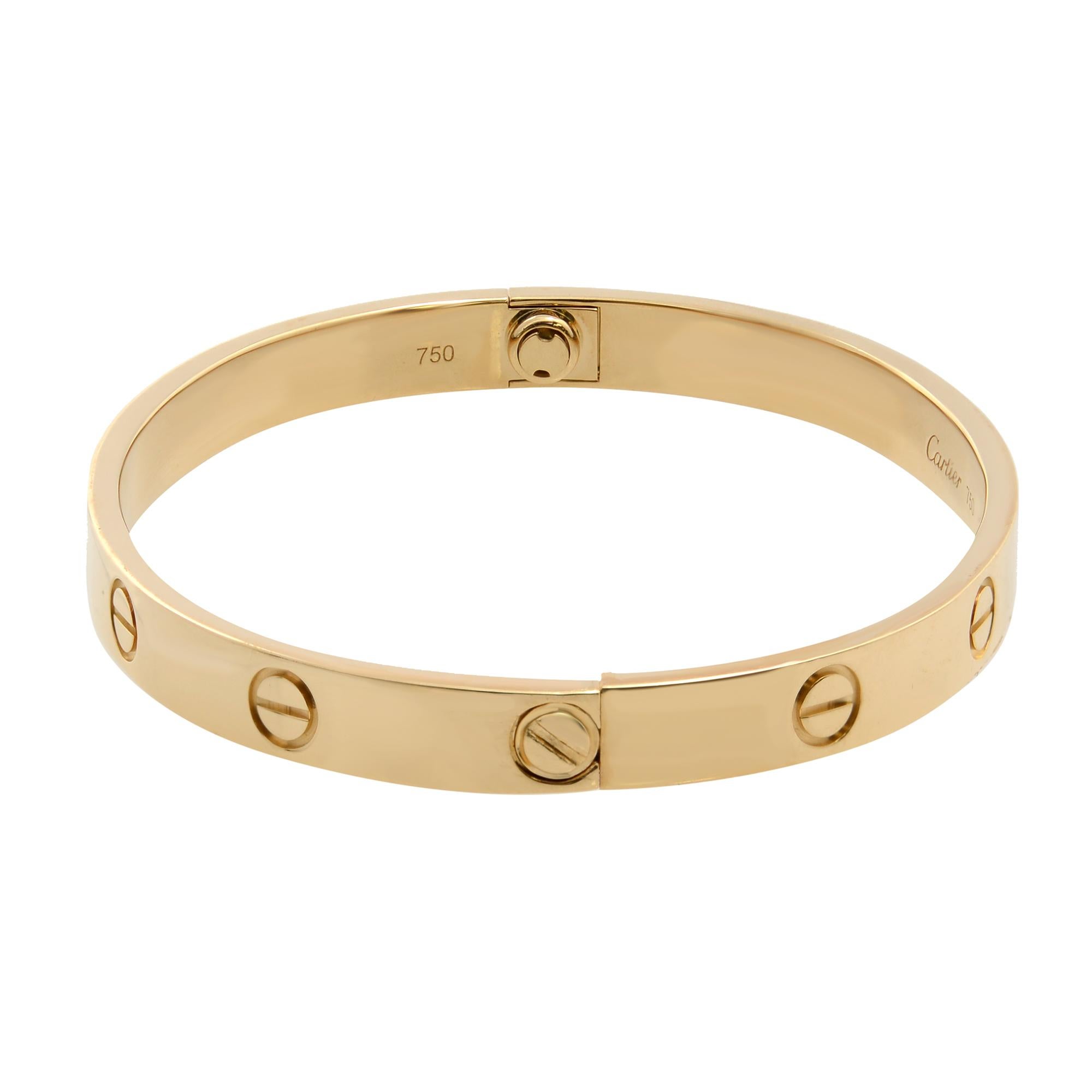 Cartier classic Love bracelet in 18K yellow gold. Size 17. New style screw system. Width: 6.1mm. Excellent pre-owned condition. Comes with a screwdriver. Original papers and box are not included.