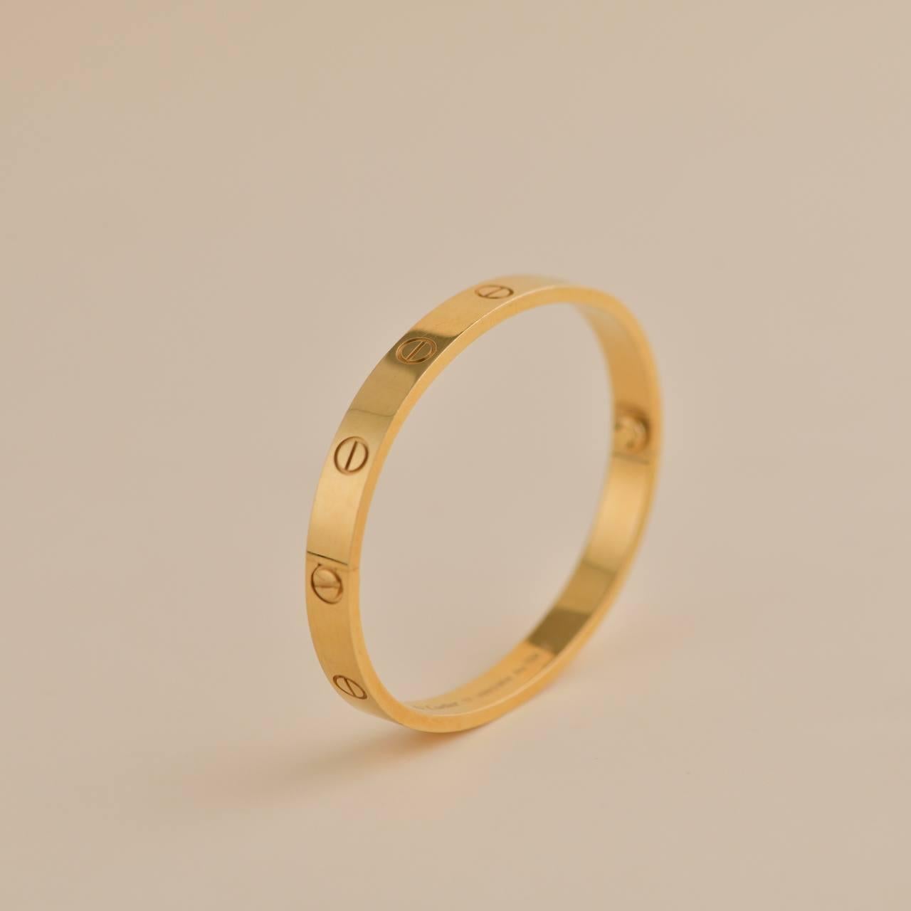 SKU	CT-2082
Comes With	Full Set (Box + Card)
RRP	£7,050 incl. VAT/ $7,350/ €7 950 incl. VAT
Model	B60081964
Serial Number	HW****
Size	17 Size Guide
Metal	18k Yellow Gold
Weight	33 g
_____________________________________________________________
If
