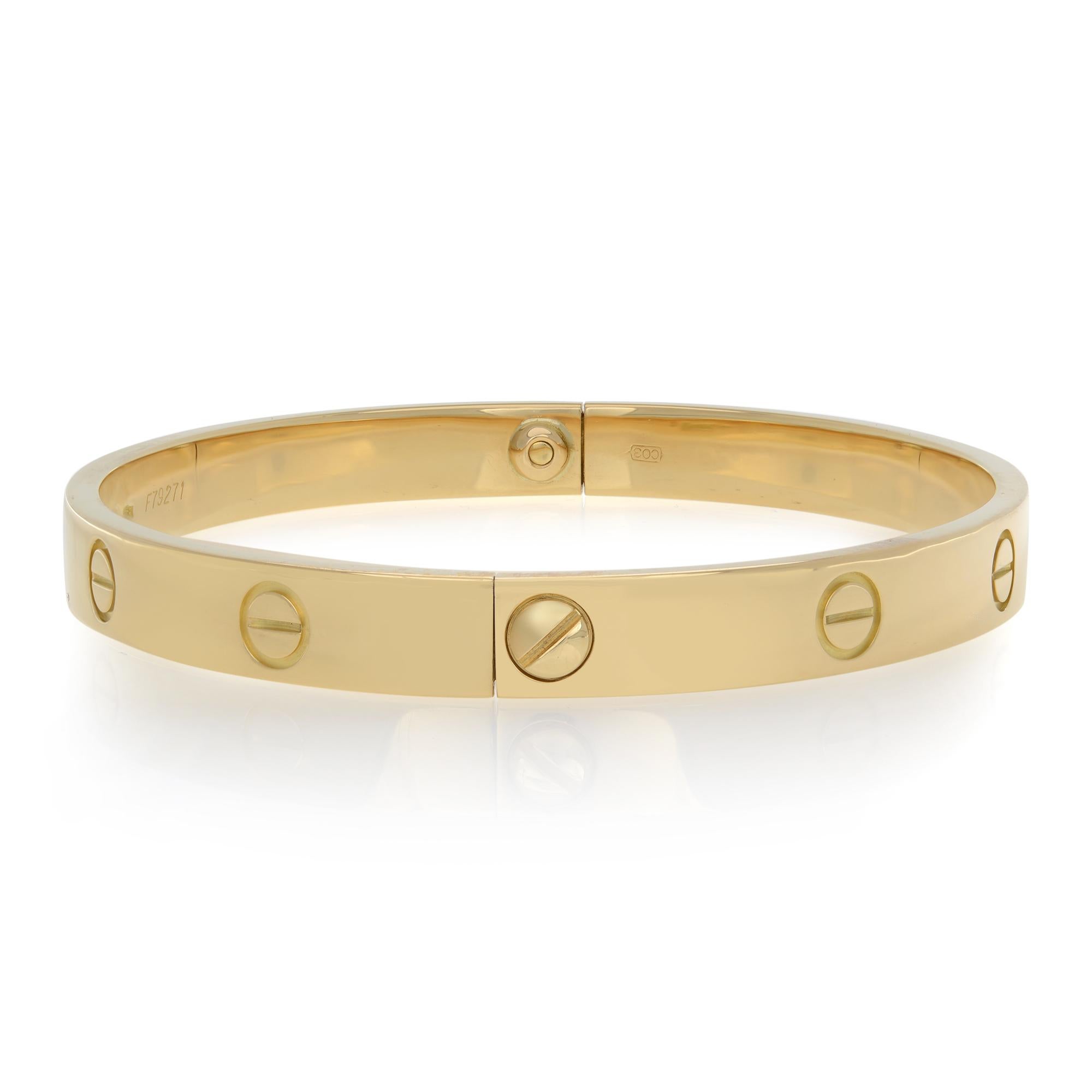 Cartier classic Love bracelet in 18K yellow gold. Size 19. Old style screw system. Width: 6.1mm. Size 19. Great pre-owned condition. Comes with screwdriver.; Original box and papers are not included. 