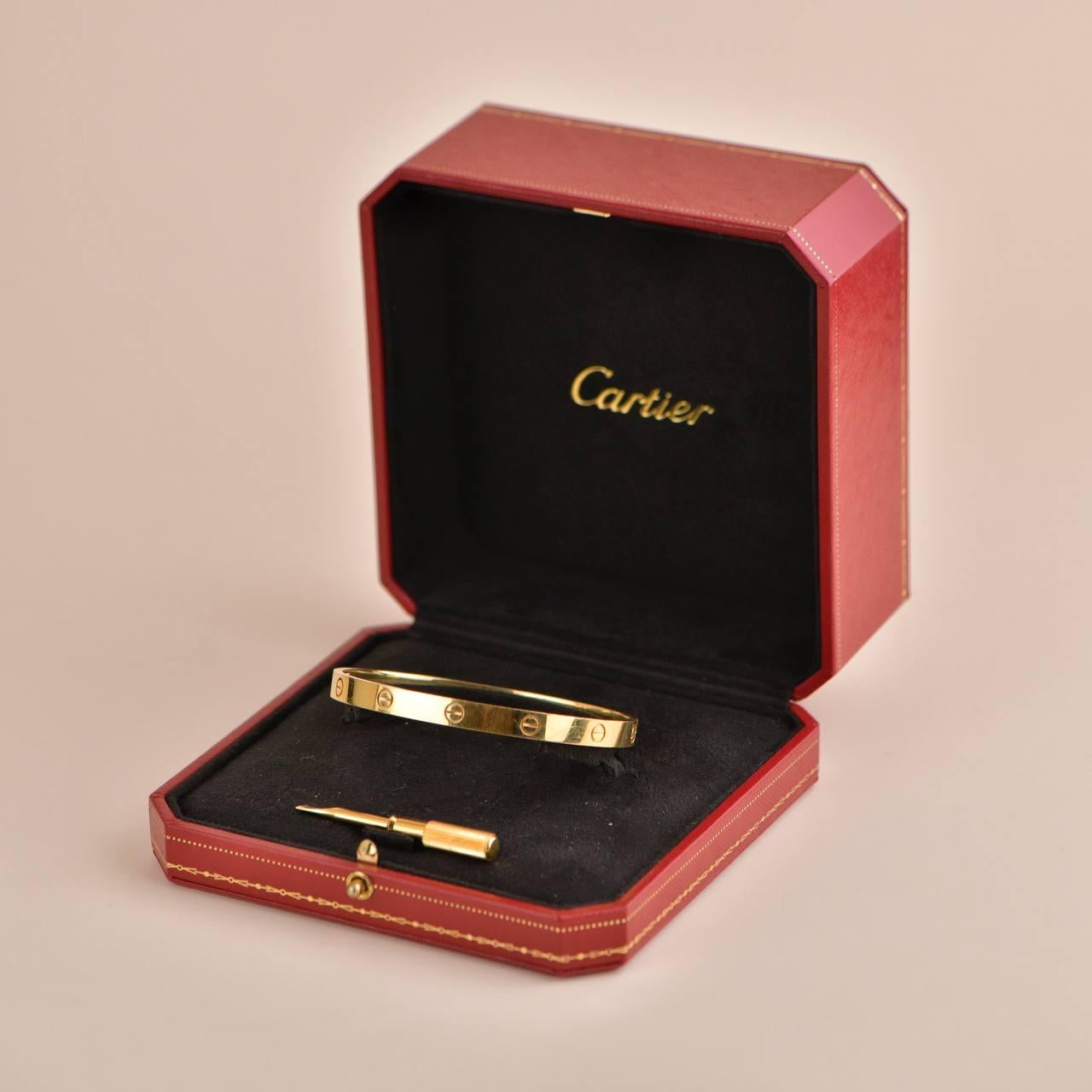 SKU 	CT-1964
Brand	Cartier
Model	B6035520
Serial No	SW****
Date	Circa 2011
_____________________________________________________________
Metal	18K Yellow Gold
Bracelet   Size 20
Weight	Approx. 38.75g
Retail Price 	£7,050 incl. VAT/ $7,350/ €7 950
