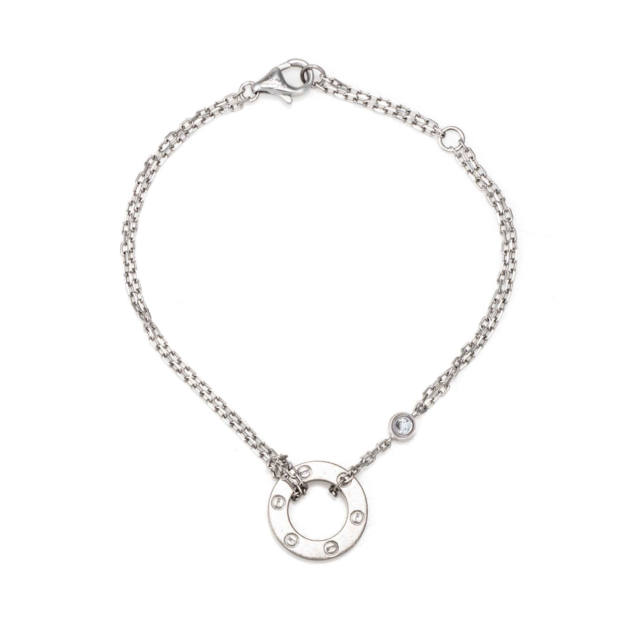 Bracciale Cartier Estate 2 diamanti Love in oro bianco 18 carati (collezione attuale).  

2 diamanti per un totale stimato di 0,03 carati (colore G-H e purezza VS1-2).

Il bracciale Cartier presenta un motivo rotondo con iscrizione d'amore al