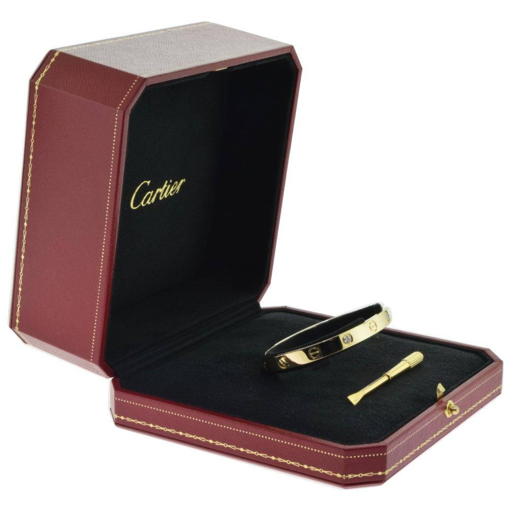 Women's or Men's Cartier Love Bracelet 4 Diamond in 18 Karat Yellow Gold