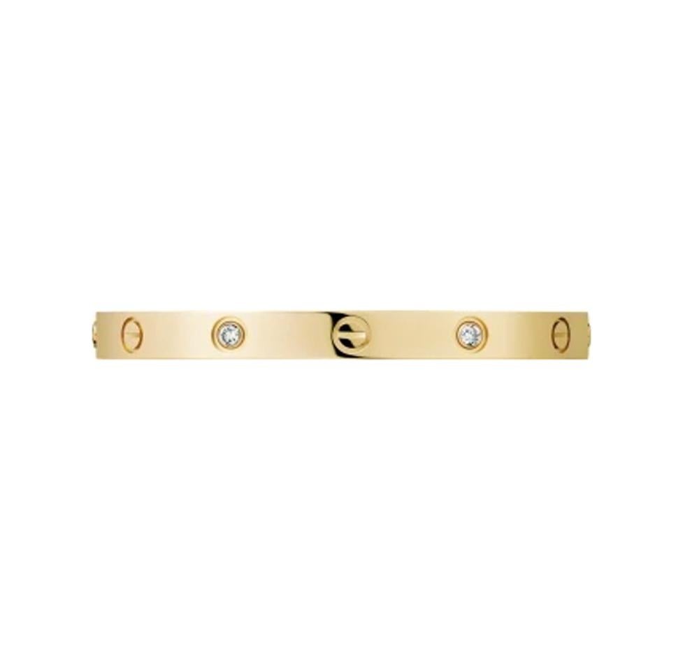 Designer: Cartier

Collection: Love

Style: Bangle Bracelet

Stone: Round Brilliant Cut Diamond

Total Carat Weight: 0.42 ct

Metal: Yellow Gold

Metal Purity: 18k

Bracelet Size: 20 = 20 cm

Hallmarks: 20, Au750 Cartier, Serial