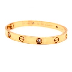 Cartier LOVE-Armband aus 18 Karat Gelbgold mit 4 Diamanten im Brillantschliff und Schraubenzieher